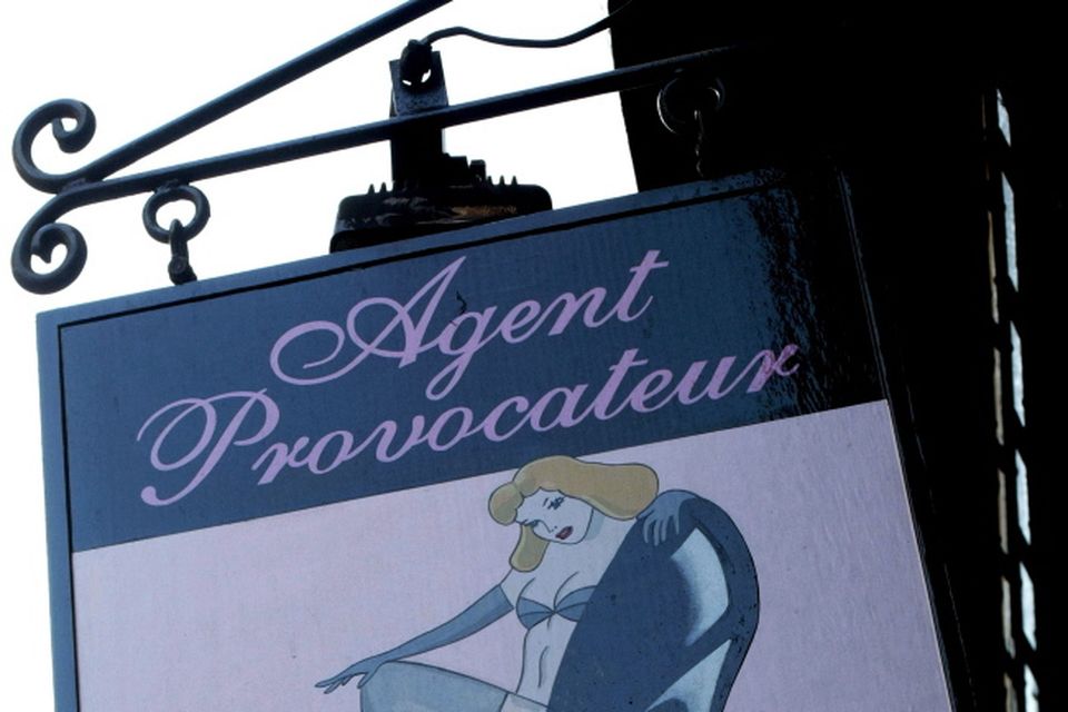 A Agent Provocateur sign in a street of London.